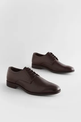 Scarpe Derby in pelle tinta unita     